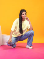 Women's Solid Light Yellow Oversized Round Neck Cotton Lycra T-shirt
